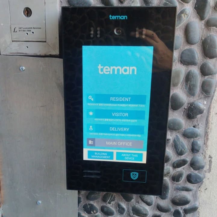 Contemporary intercom system in the lobby of a contemporary apartment building